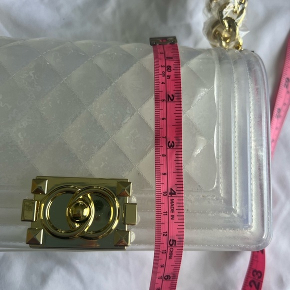 Elegant transparent padded bag with golden details are two bags for only 35